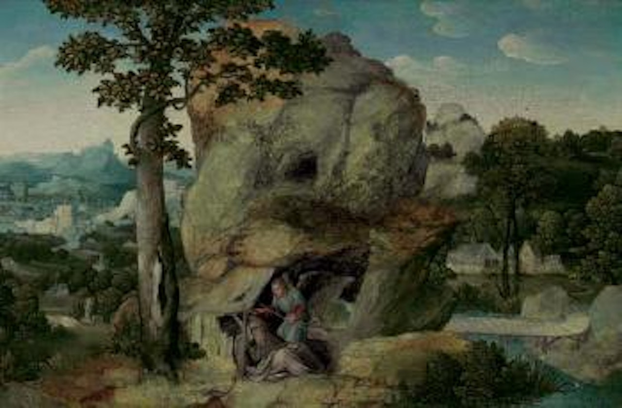 An extensive landscape with Elijah and the Angel by Joachim Patenier