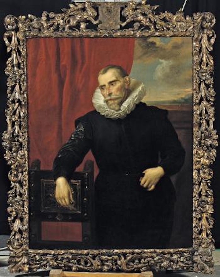 Portrait of a gentleman, three-quarter length, in a black costume with a white collar, leaning on a chair before a red curtain by Anthony van Dyck