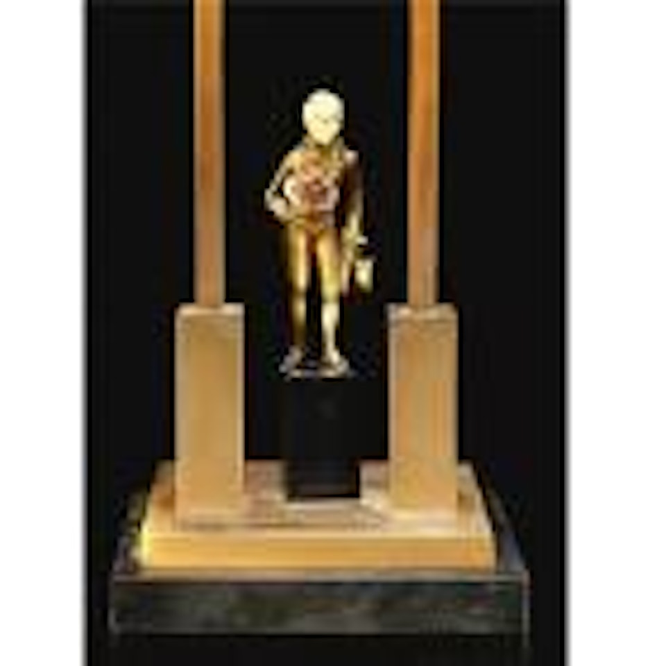 Victorian boy: a figure mounted as a lamp by Ferdinand Preiss