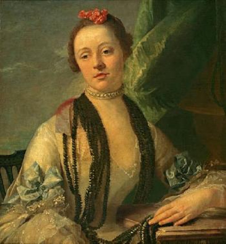 A portrait of a lady, half-length, seated at a table, wearing a white dress decorated with blue ribbons by Italian School