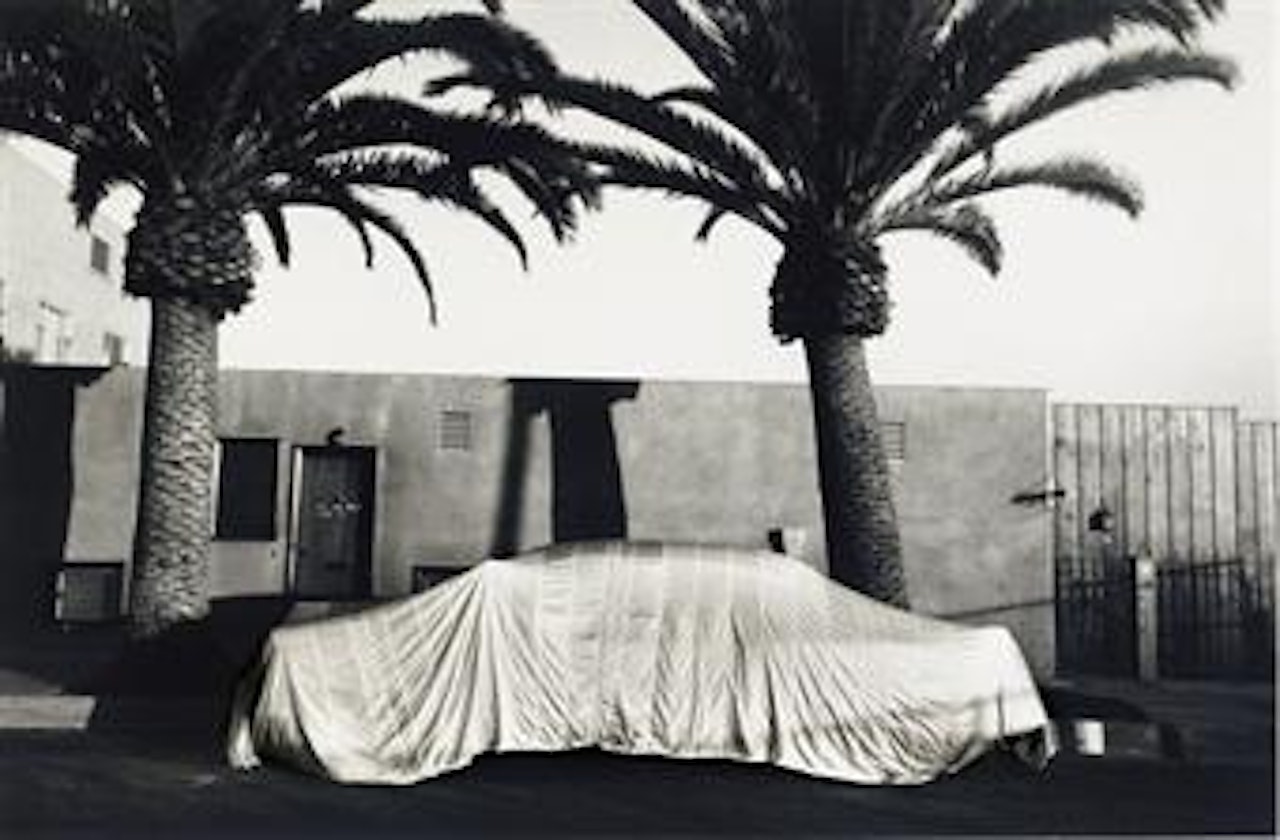Covered car - Long Beach, California by Robert Frank
