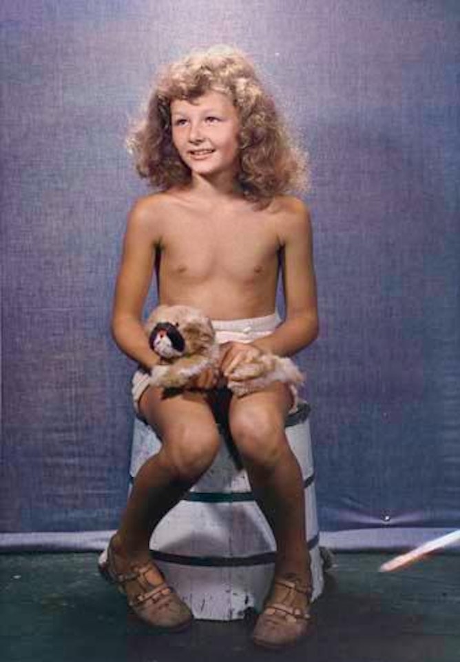 Girl with toy dog by Paul Outerbridge