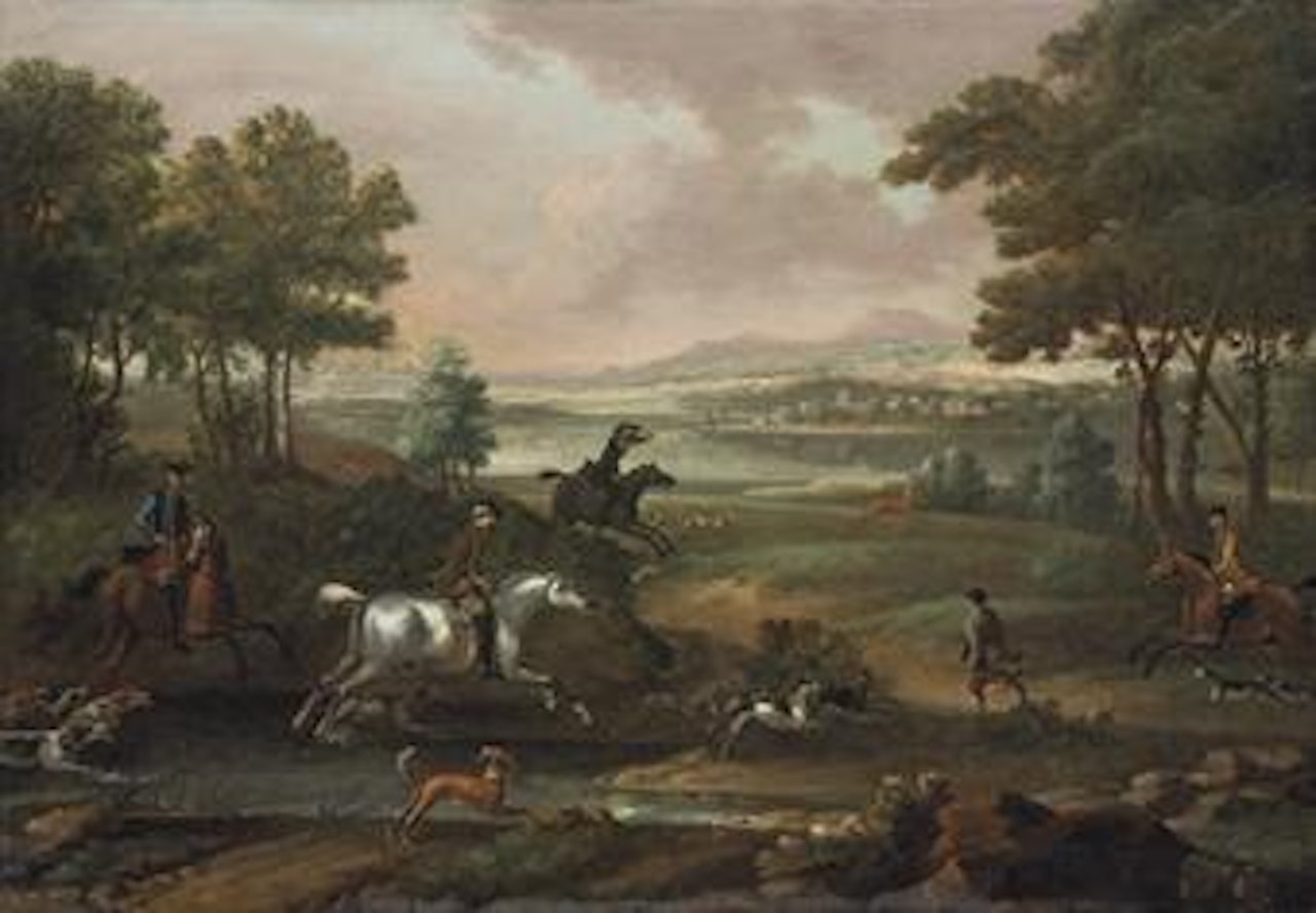 A staghunt, with hounds and huntsmen closing in, in an extensive river landscape with a town and mountains beyond by John Wootton