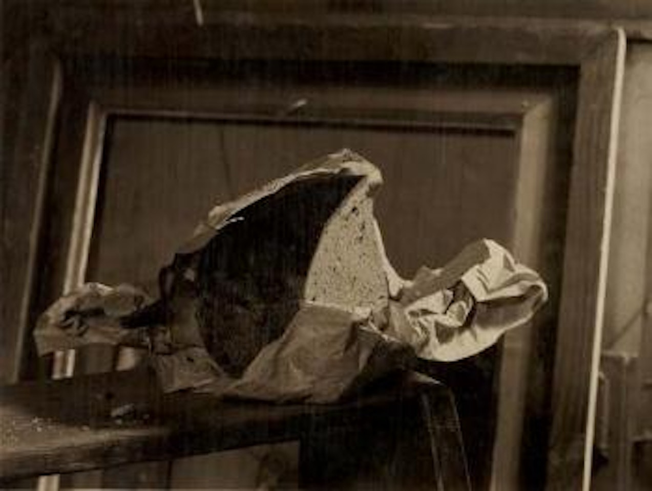 Still life with brown bread by Josef Sudek