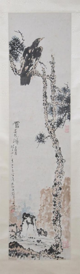 Bird perched on pine tree by Pan Tianshou