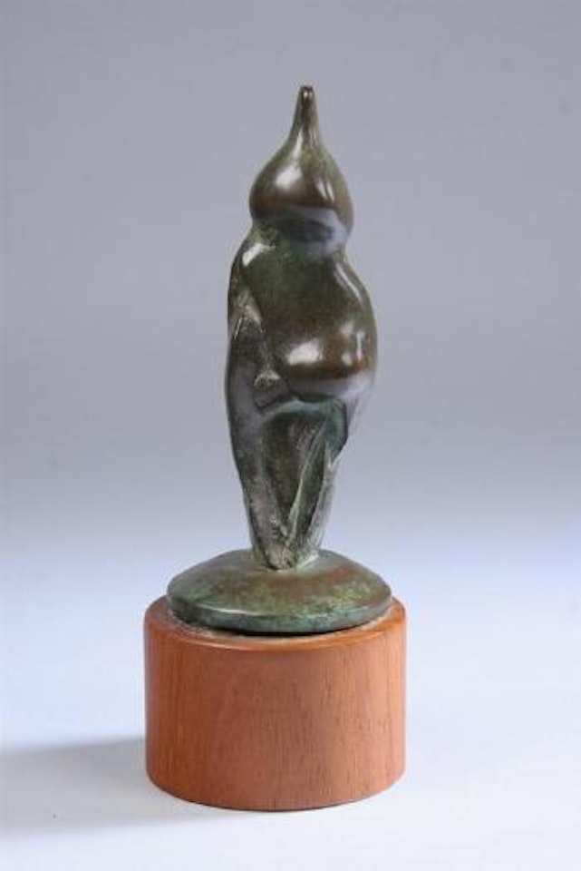 Standing figure on round base by Henry Moore