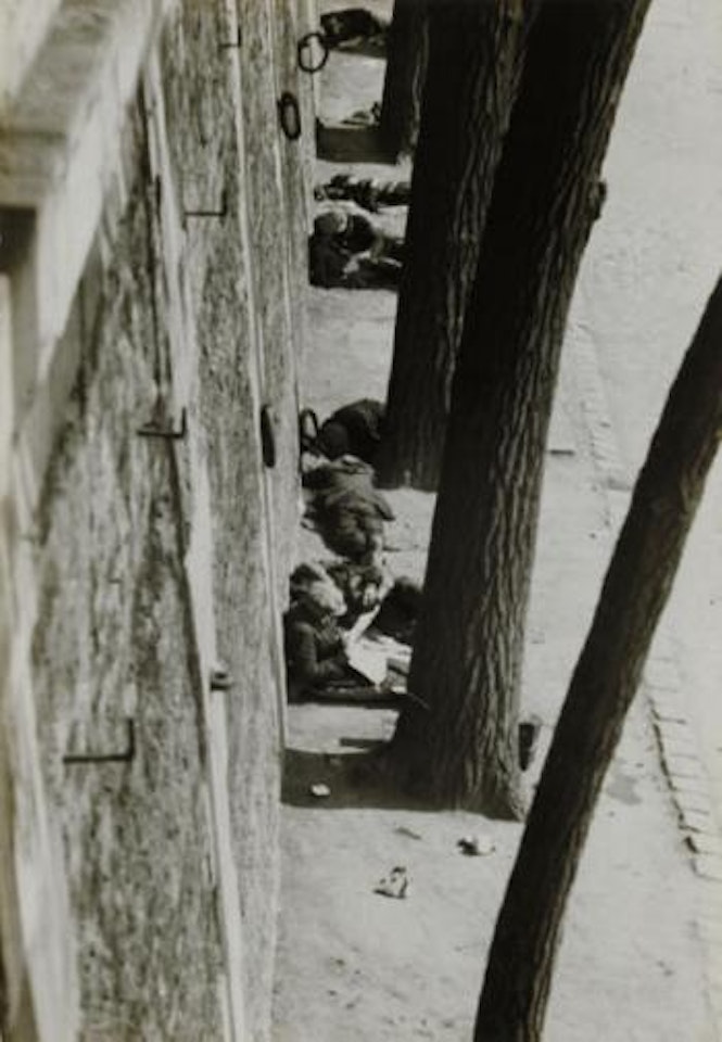 Les Clochards by André Kertész