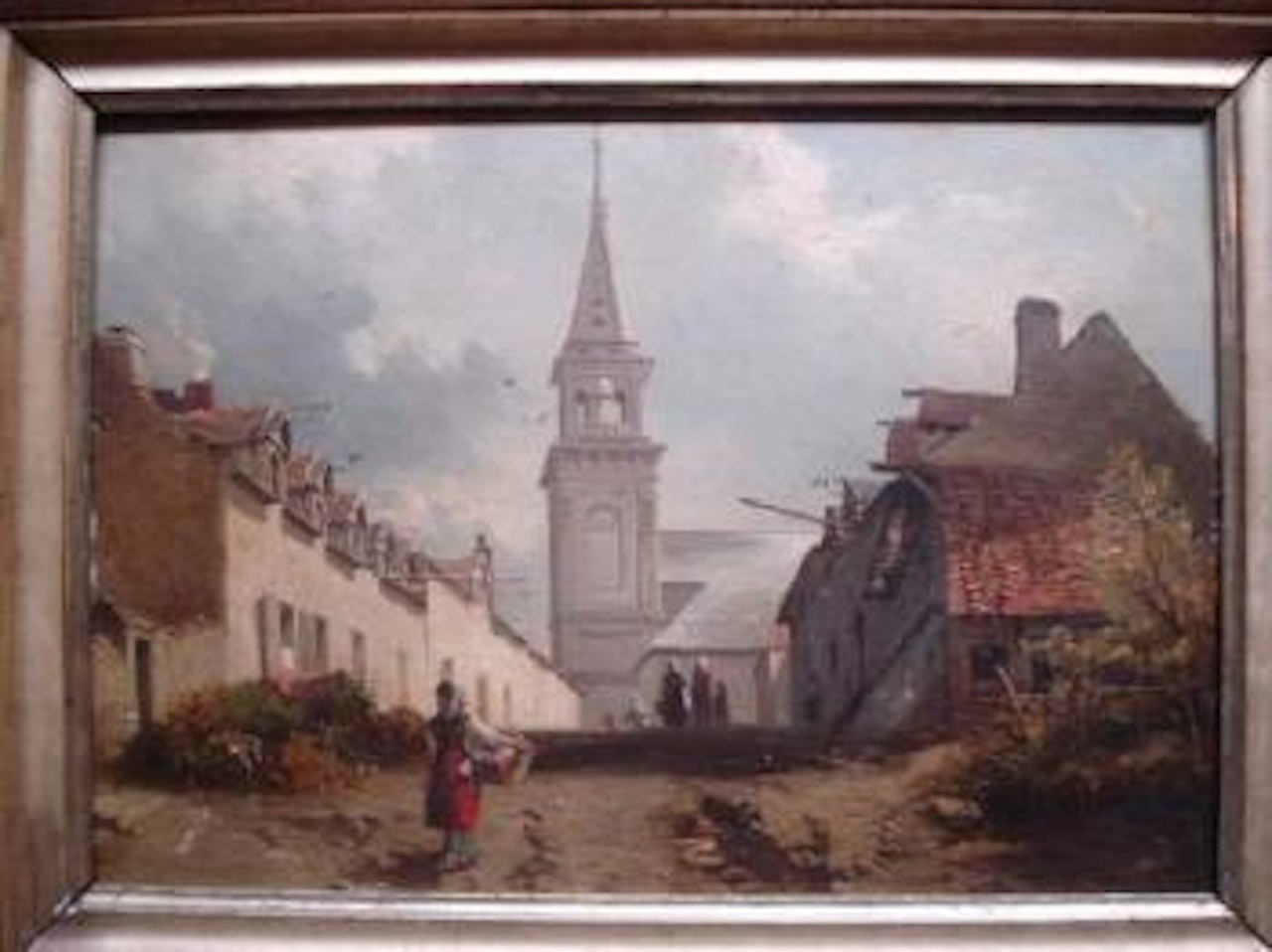 Rue de village animé de promeneurs et d'une jeune fille tenant un panier de linge by Charles Hoguet