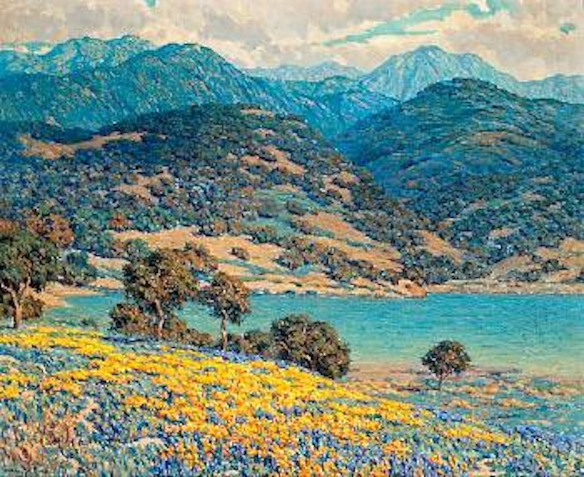 Poppies and lupine by a lake with mountains in the distance by Granville Redmond