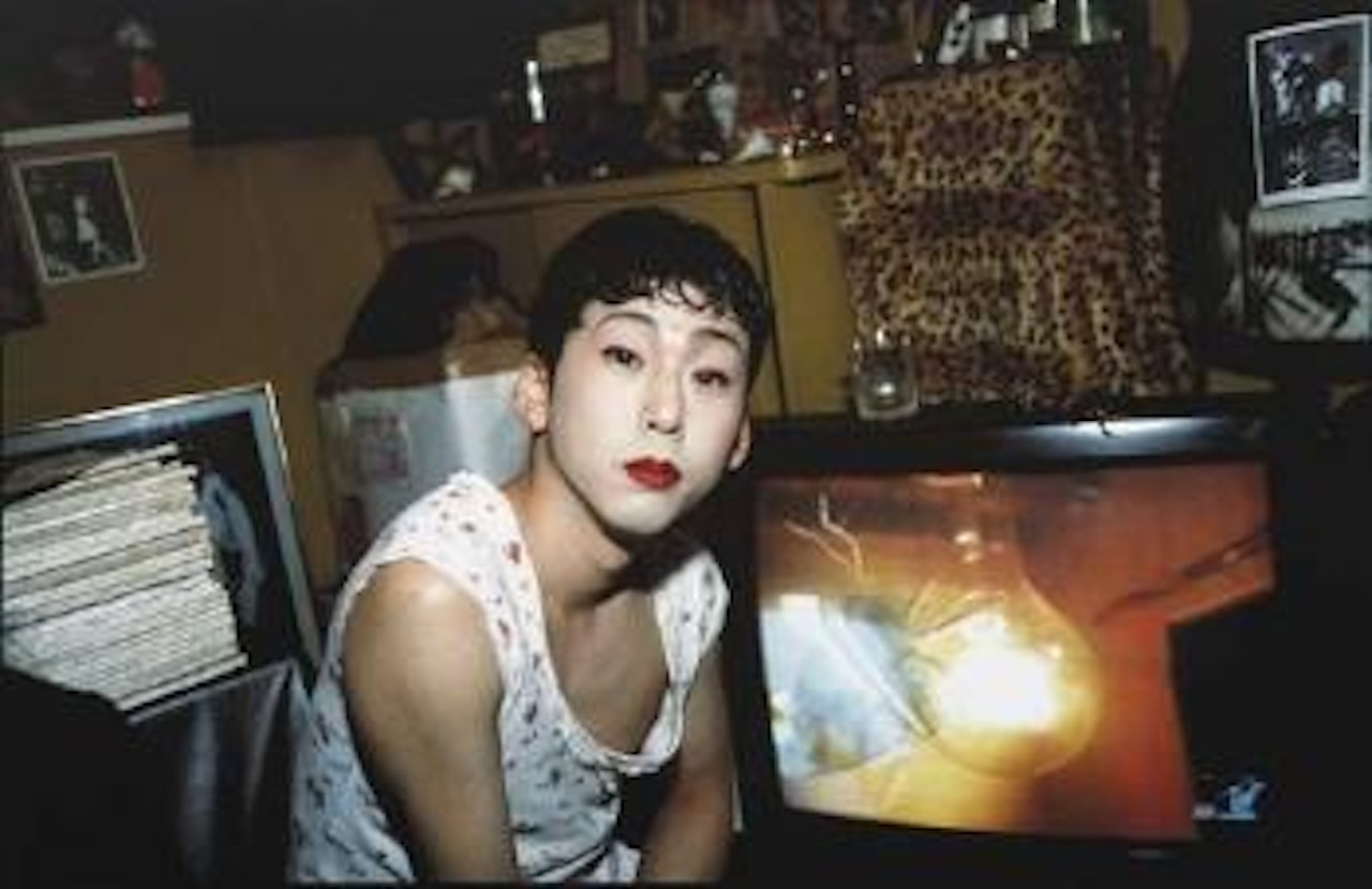 Tomoyuki in Front of T.V., Tokyo by Nan Goldin