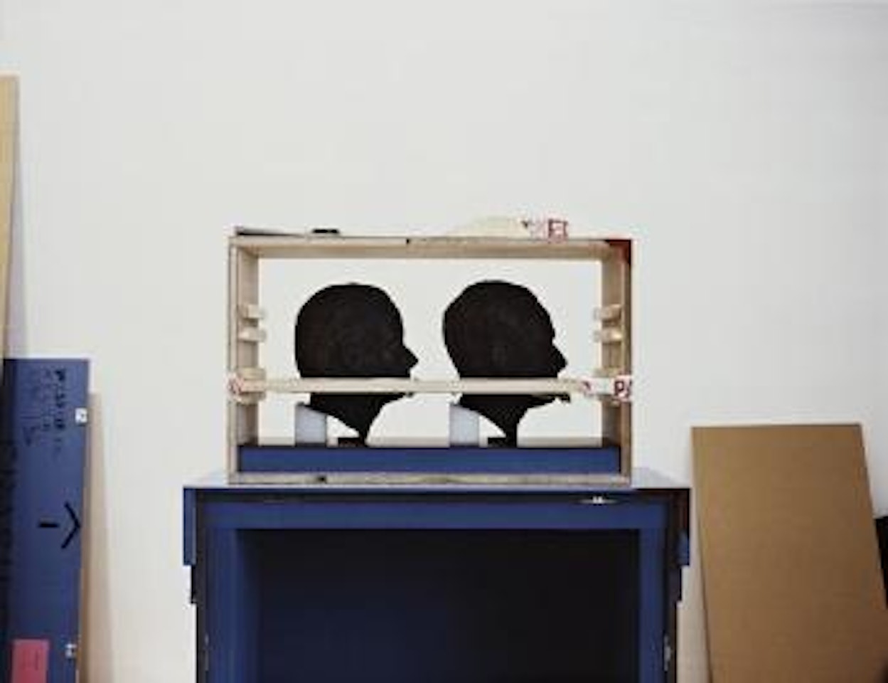 Two Heads by Louise Lawler