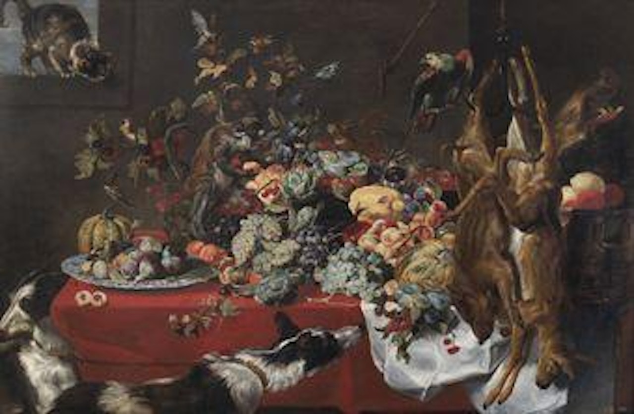 A draped table laden with fruit, nuts and berries, with a cat, birds, a parrot, a squirrel, a monkey, hounds, a boar's head and a buck and a fawn hanging from a hook by Frans Snyders