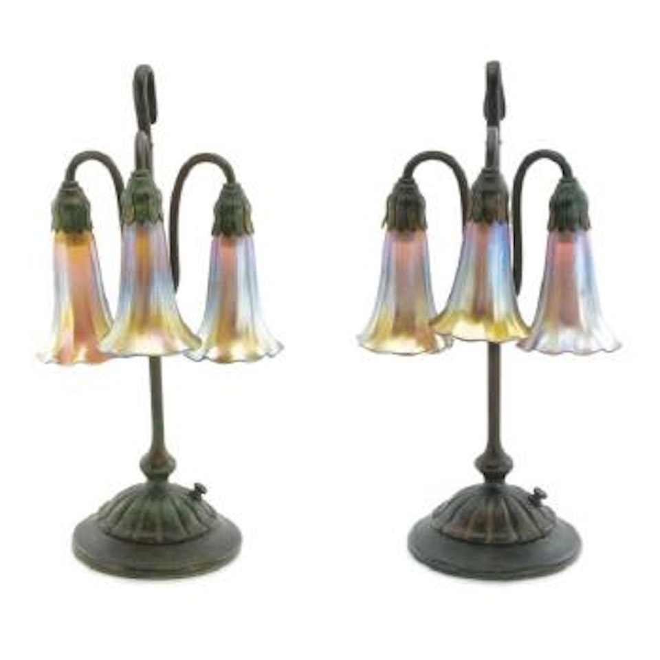 A Pair Of Three-light Lily Table Lamps by Tiffany Studios