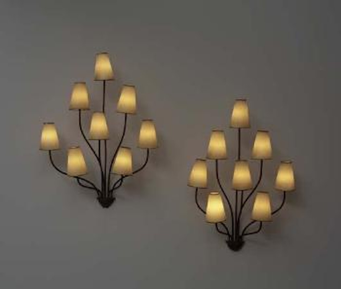 Fine and rare pair of eight-arm Persane sconces by Jean Royere