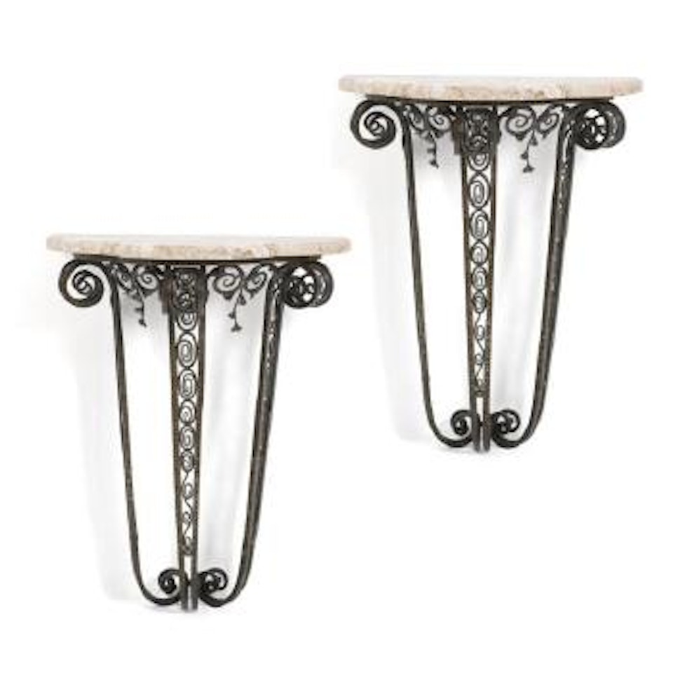 A Pair Of Small Consoles by Edgar Brandt