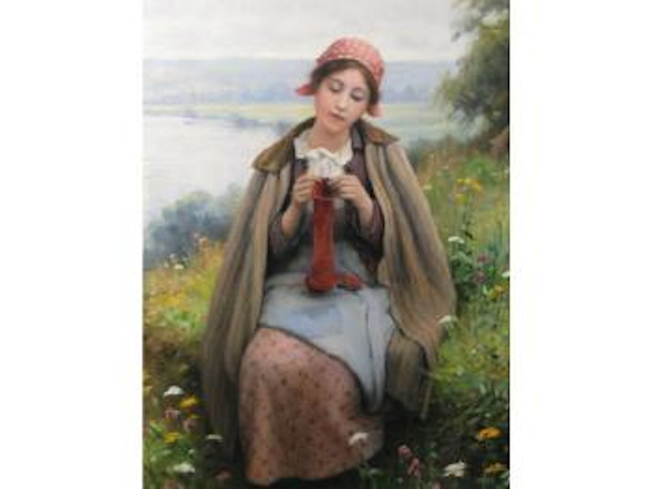 Girl knitting by Daniel Ridgway Knight