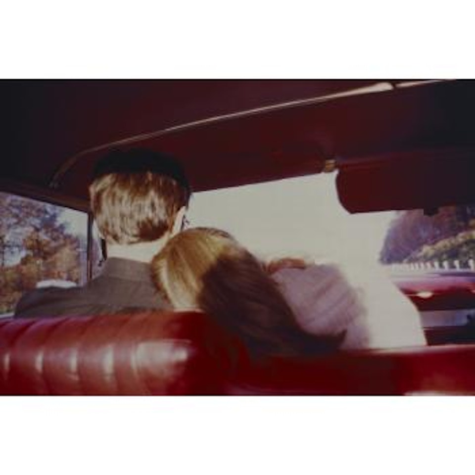 Kim and Mark in the red car, Newton, MA by Nan Goldin