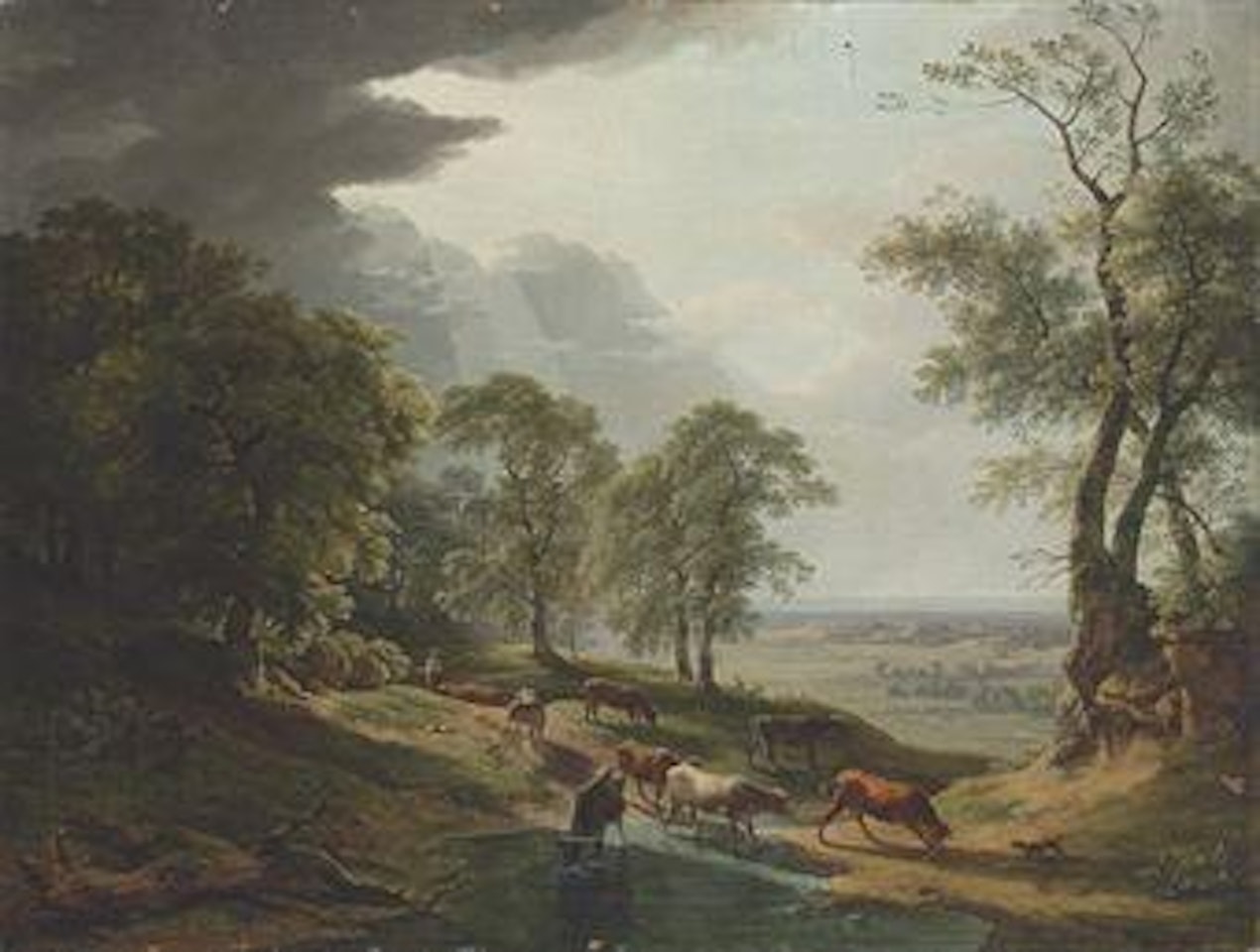 An extensive wooded, river landscape, with cattle watering in the foreground by Hendrik Voogd