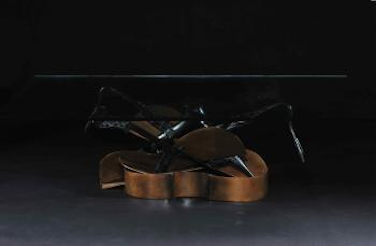 Table aux violons et saxophones by Arman