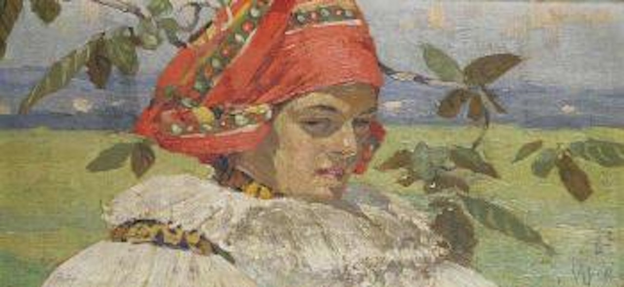 A girl in a folk costume by Joza Uprka