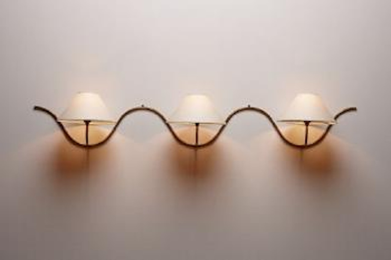 Serpentin wall light by Jean Royere