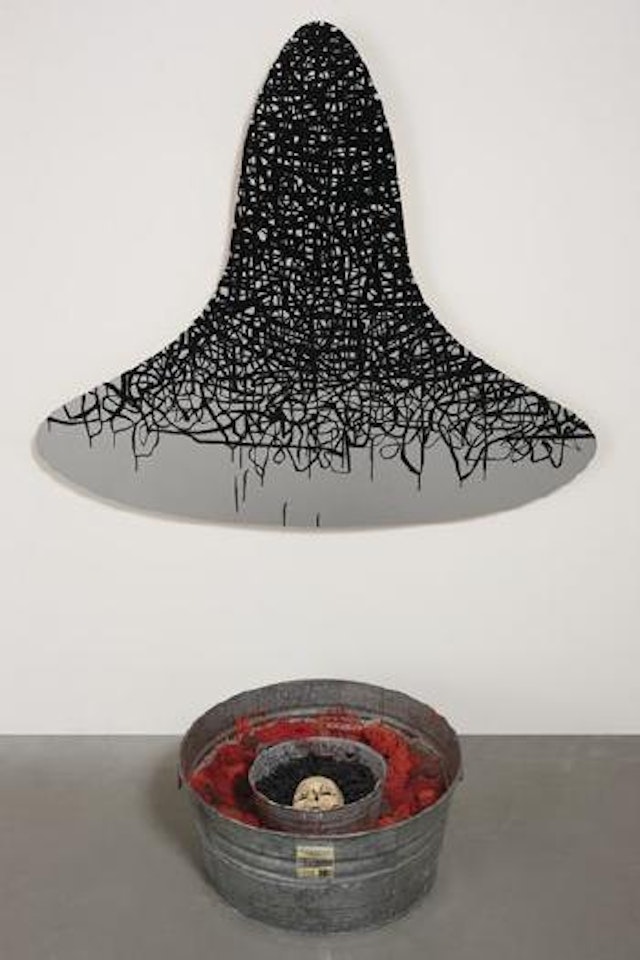 Towhead n'Ganga, enclosed in darkness, lorded over by the sexualized - folded - high priestless form by Mike Kelley