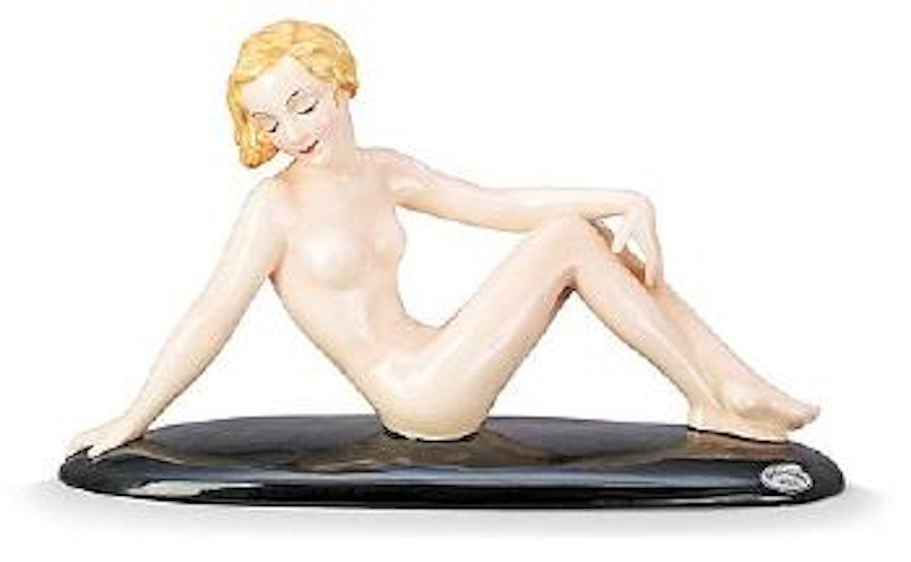 A Goldscheider creamware figure by Josef Lorenzl