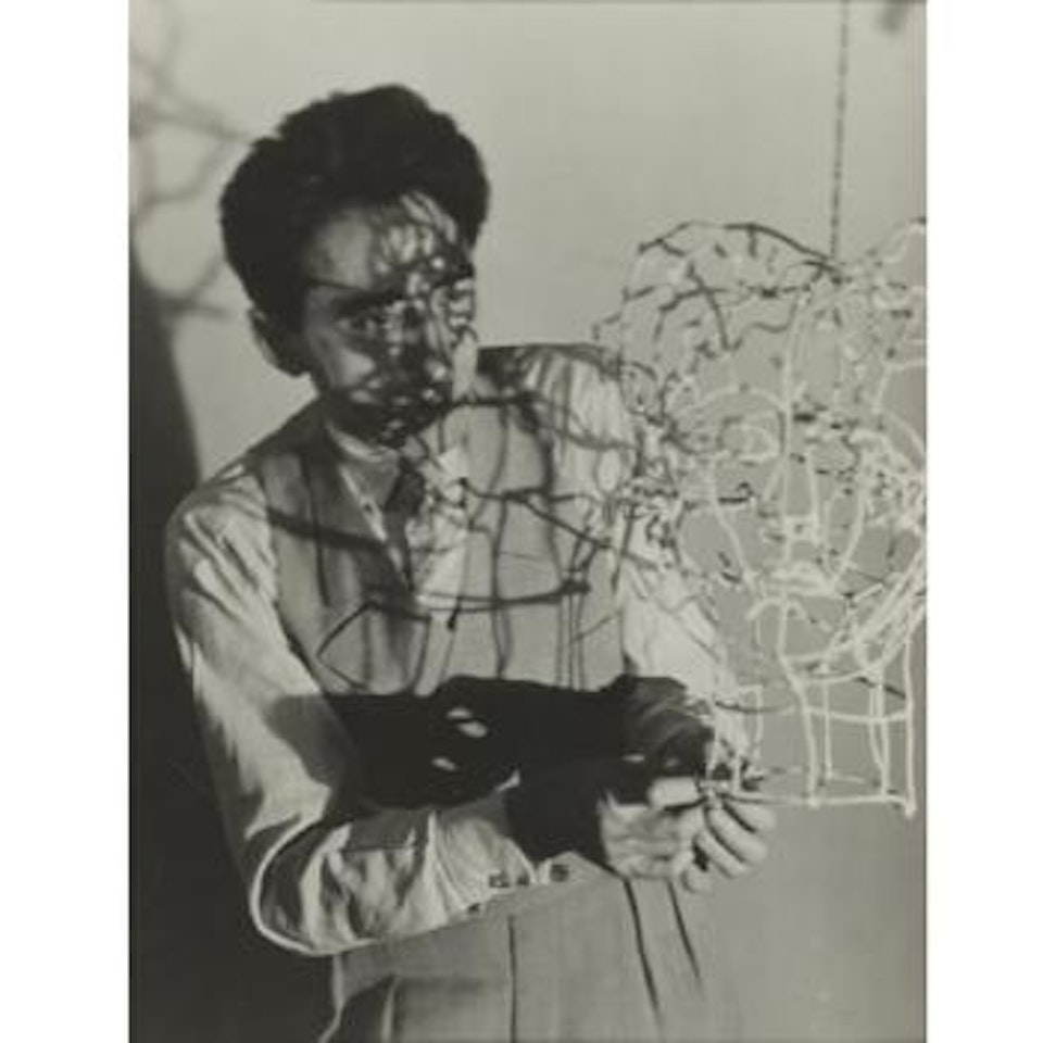 Jean Cocteau And Wire Sculpture by Man Ray