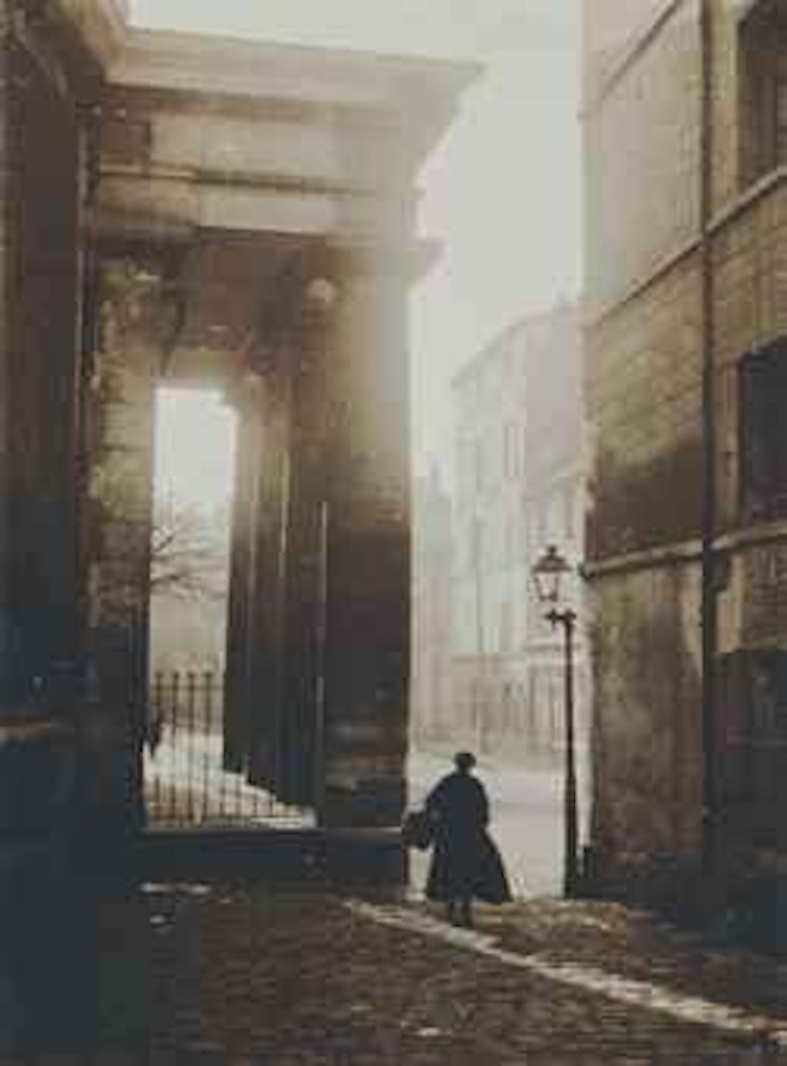 Untitled (Figure and column with street lamp), by André Kertész