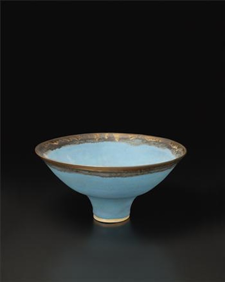 Blue bowl with golden rim by Lucie Rie