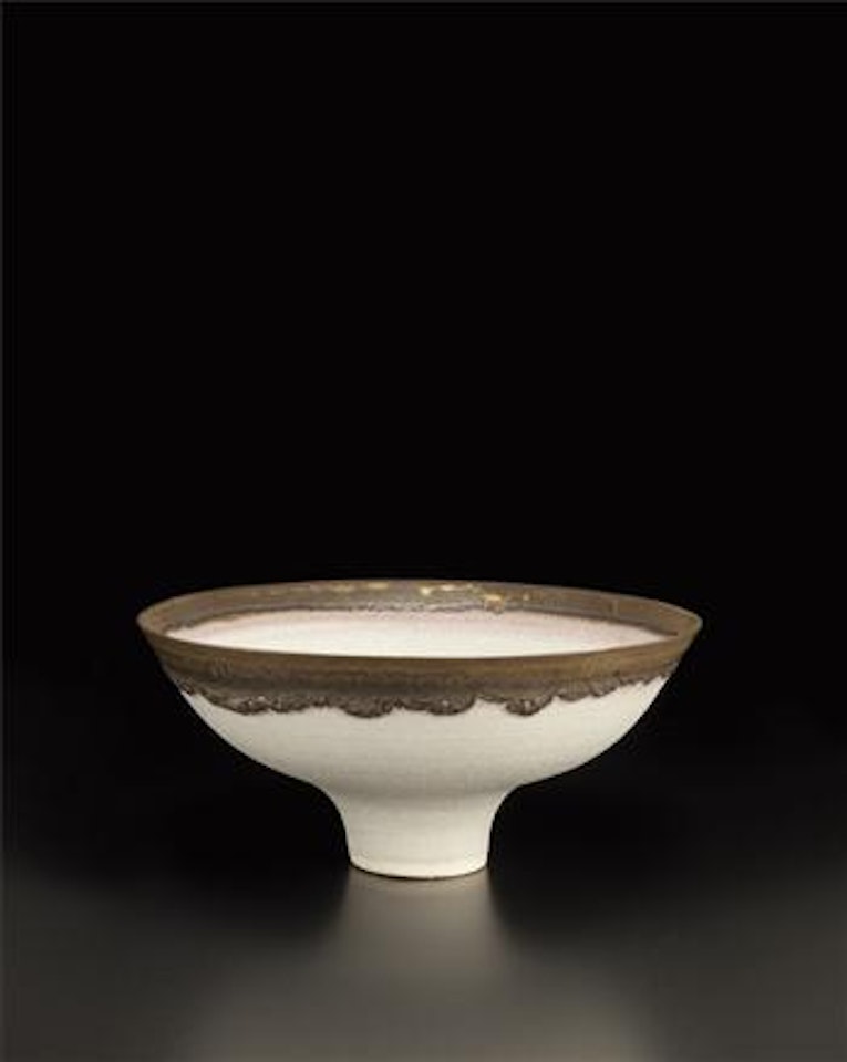 White bowl with golden lip by Lucie Rie