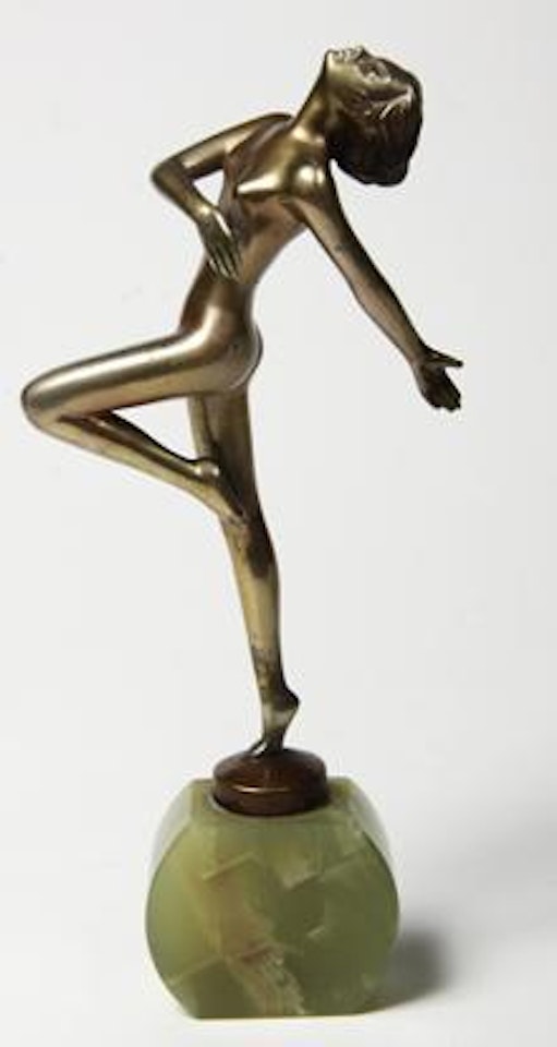 Young woman adopting a stylish pose by Josef Lorenzl