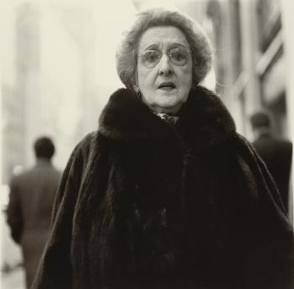 Woman In A Mink Coat On The Street, N. Y. C. by Diane Arbus by Neil Selkirk
