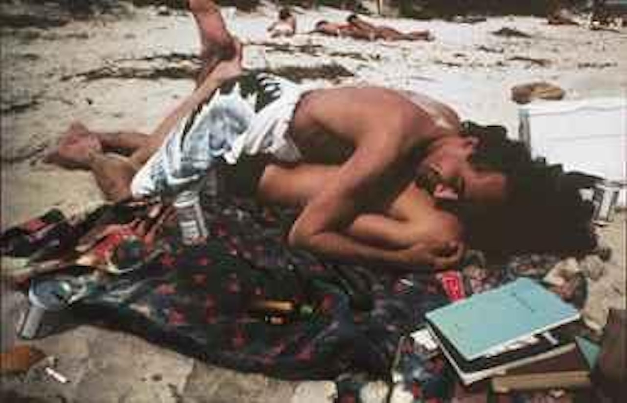 Bruce on top of French Chris, Fire Island by Nan Goldin