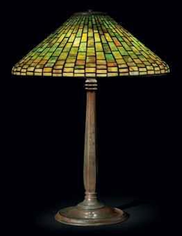 A Geometric Leaded Glass and Bronze Table Lamp by Tiffany Studios
