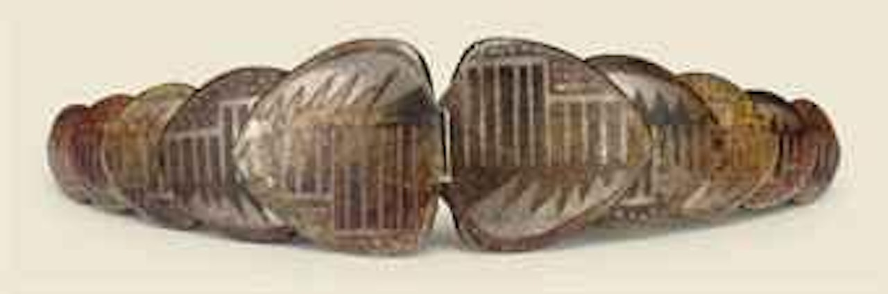 A Silvered and Patinated Metal Belt Buckle by Jean Dunand