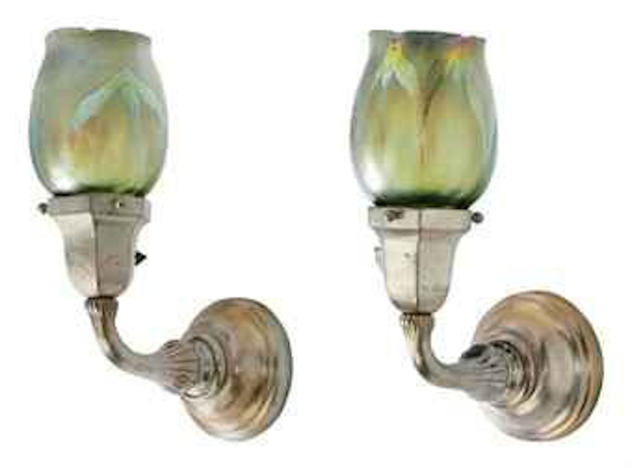 A Pair of Favrile Glass and Silvered Bronze Sconces by Tiffany Studios
