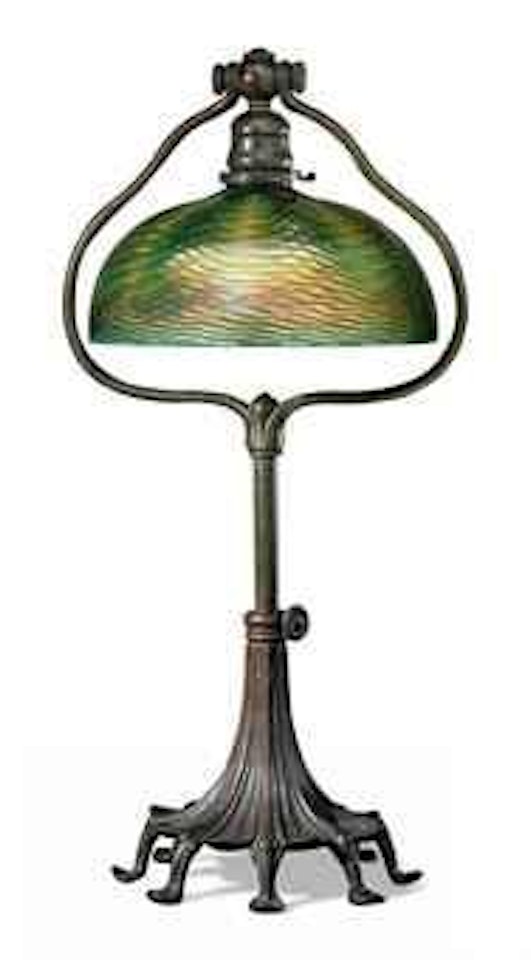 A Favrile Glass and Bronze Adjustable Desk Lamp by Tiffany Studios