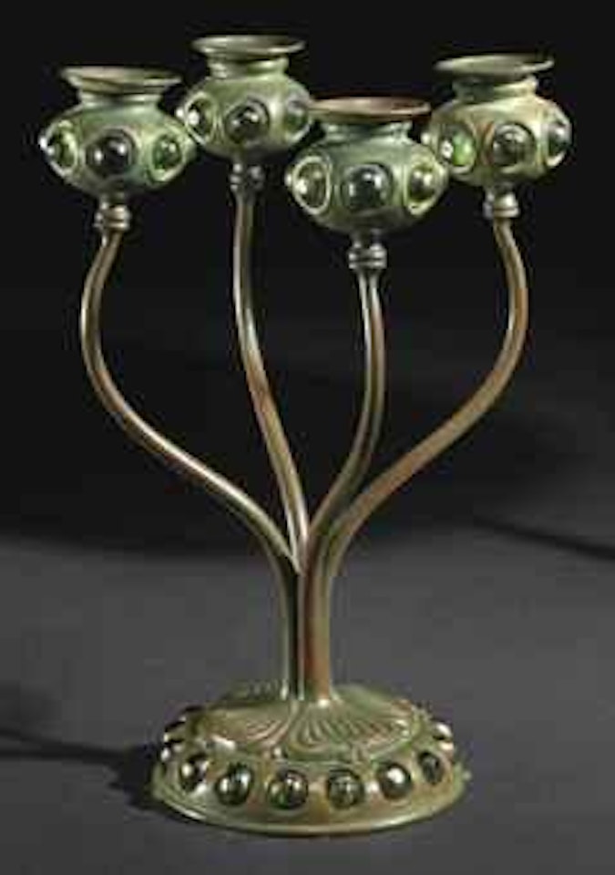 A Jeweled Favrile Glass and Bronze Four-Light Candelabrum by Tiffany Studios