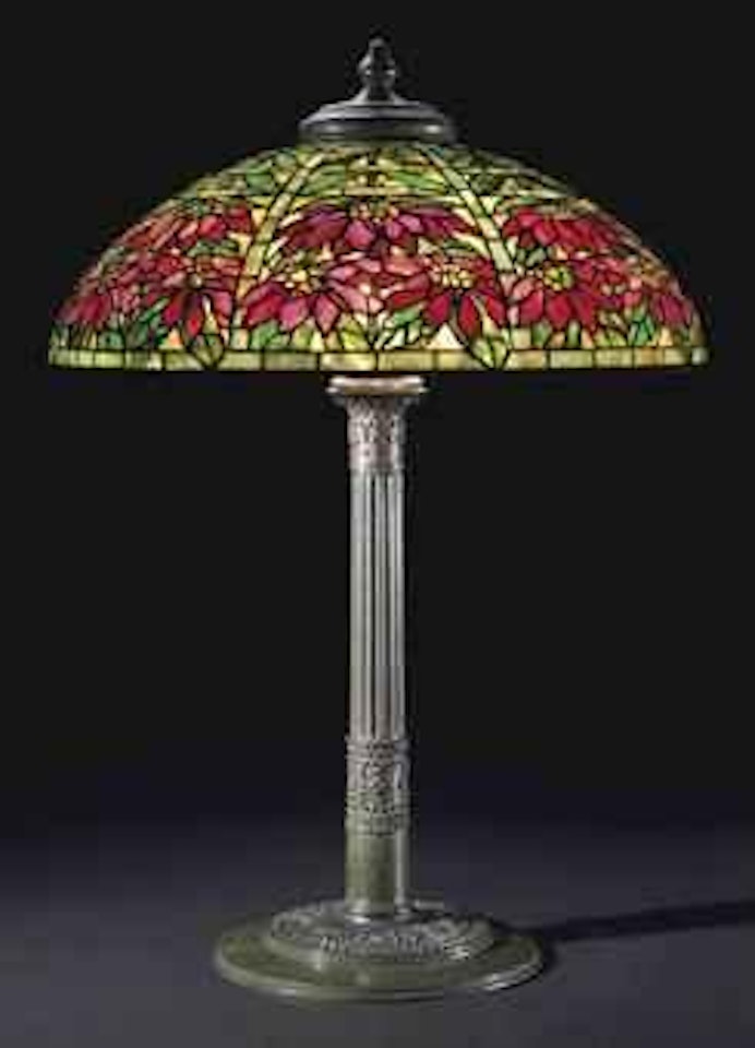 A Poinsettia Leaded Glass and Bronze Table Lamp by Tiffany Studios