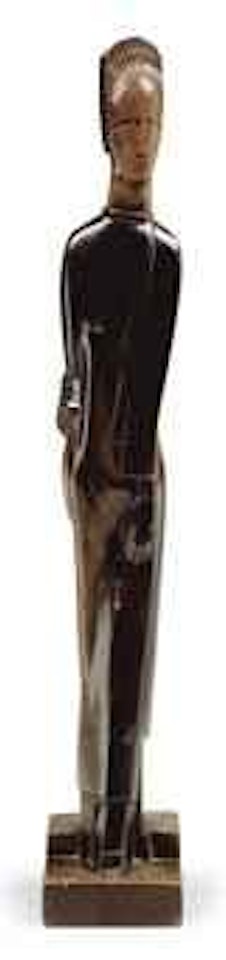 A Carved Pear Sculpture of Walking Female Figure by Gustave Miklos