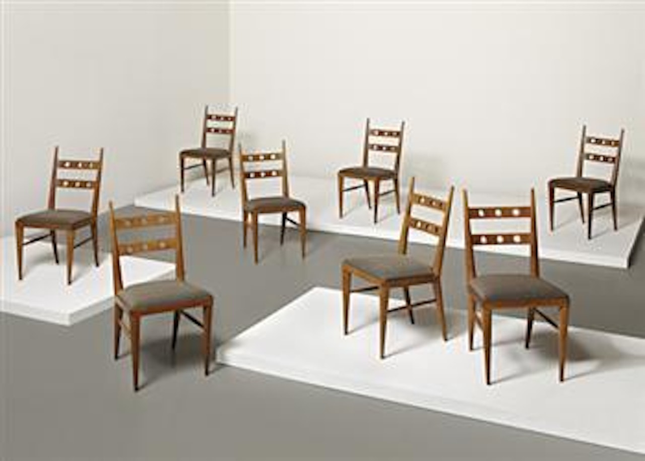 Set of eight dining chairs by Jean Royere