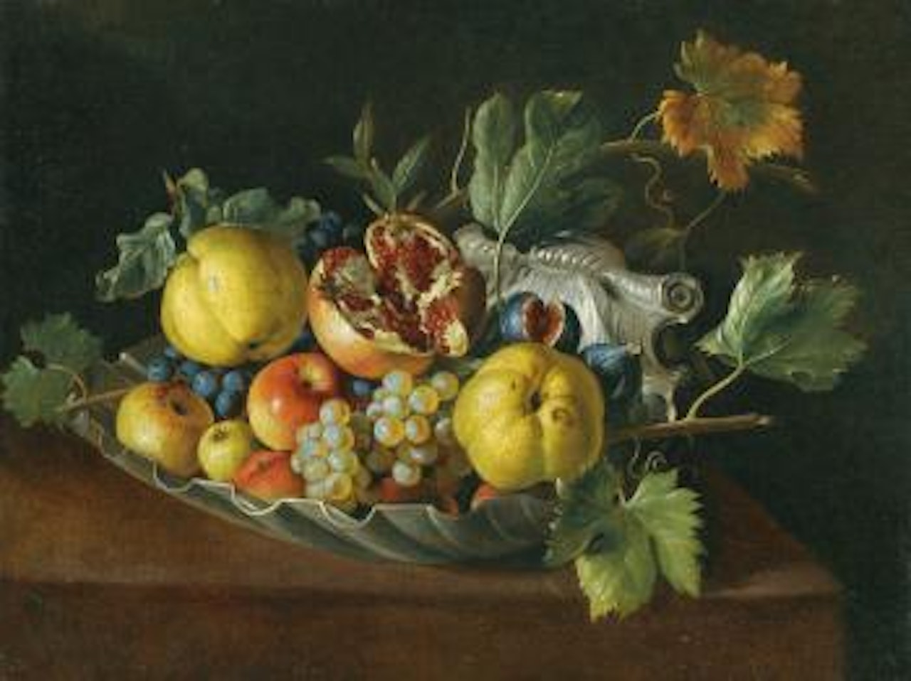 A Still Life With Quinces, Figs, Apples, Grapes And a Pomegranate On a Shell-shaped Silver Dish On a Covered Table by Roman School