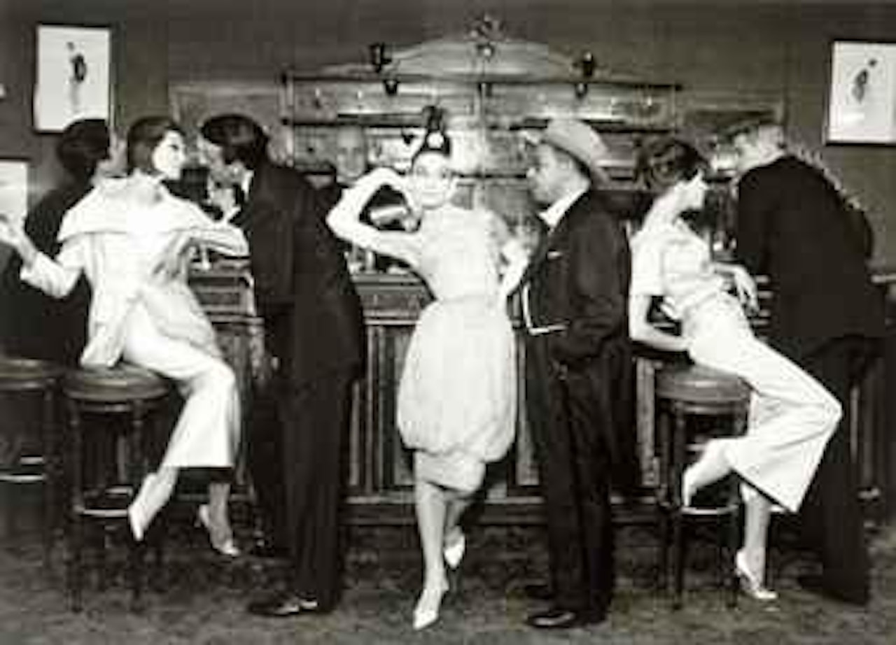 Audrey Hepburn and Art Buchwald, Simone, Barbara Mullen, Frederick Eberstadt and Dr. Reginald Kernan, Evening dresses by Balmain, Dior, Patou, Maxim's, Paris, August 1959 by Richard Avedon