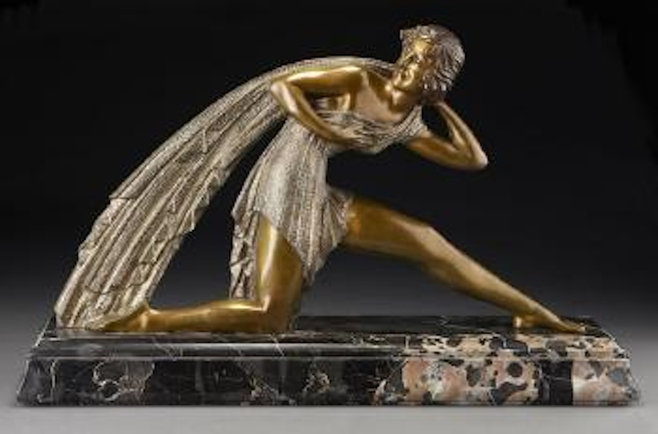 A draped woman lunging forward by Demetre Chiparus