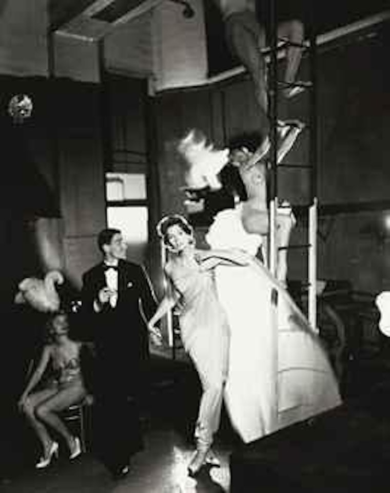 Suzy Parker and Robin Tattersall, Evening Dress by Griffe, Folies-Bergère, Paris, August 1957 by Richard Avedon