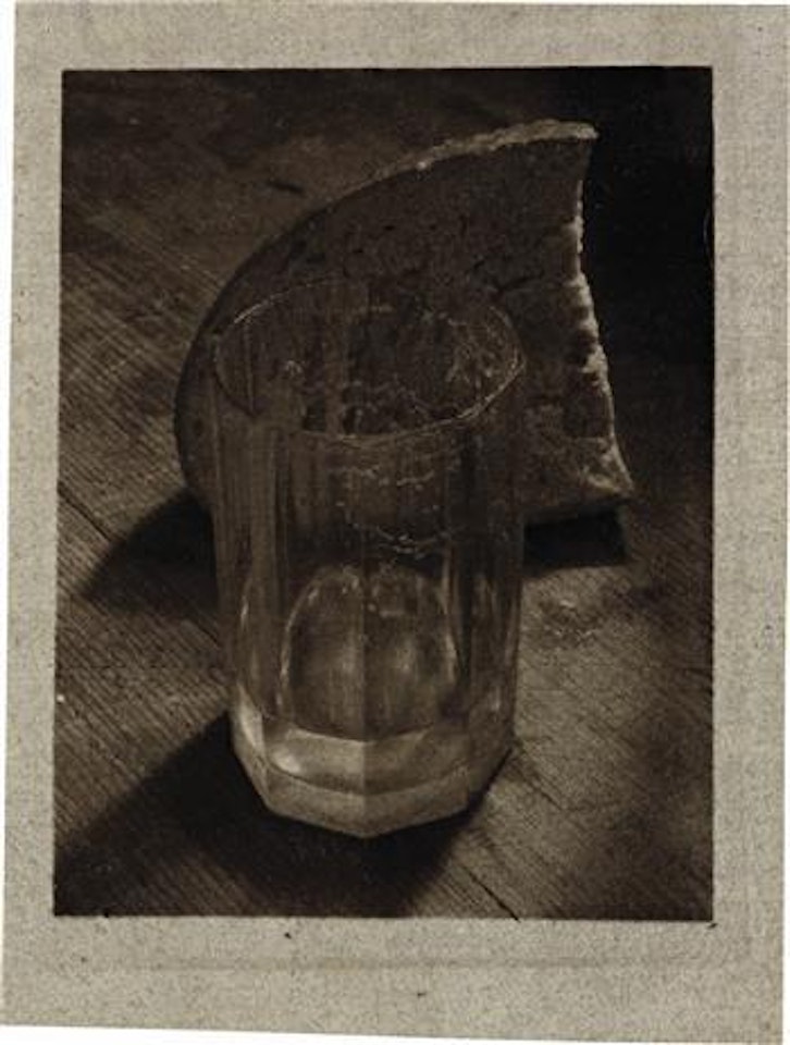 Glass and slice of bread by Josef Sudek