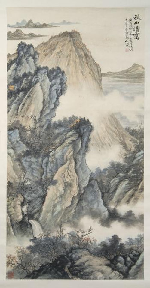 A blue mountain landscape with fall foilage and cottages by Wu Hufan