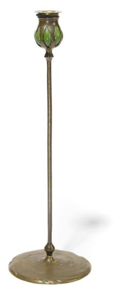 A Tiffany Studios Favrile blow out glass and bronze candlestick by Tiffany Studios