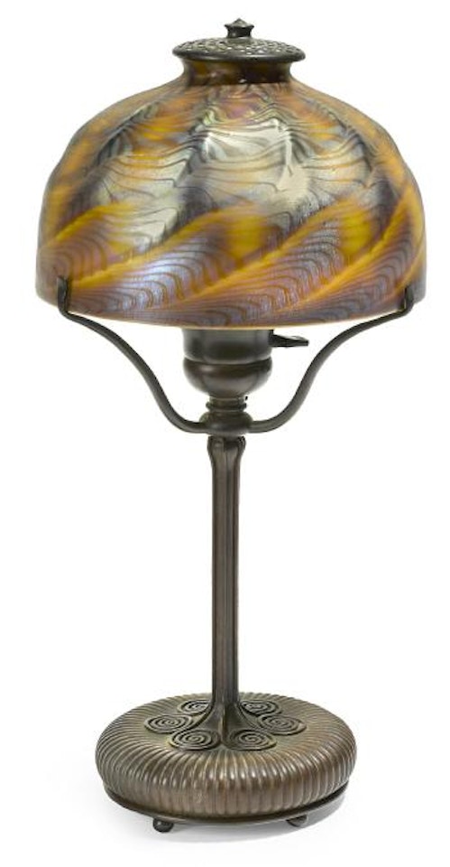 A Tiffany Studios Favrile glass and bronze table lamp by Tiffany Studios